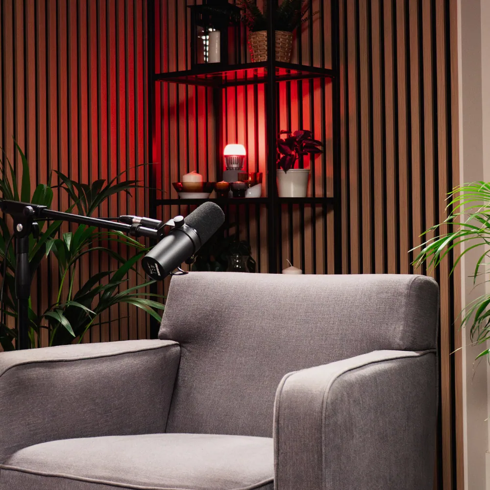 Podcast set with microphone and armchair